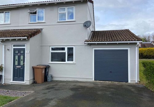 Newly Fitted Up And Over Garage Door Replacement